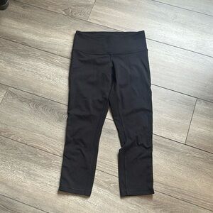 60. Lululemon black crop 22” inseam with velvet detail on side of leg